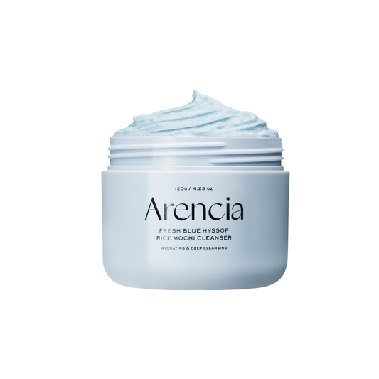 ARENCIA Fresh Royal Blue Hyssop Rice Mochi Cleanser is a gentle facial cleanser enriched with Hyssop Extract, Sweet Almond Seed Meal, and Rice Powder for deep cleansing without stripping the skin. Kaolin clay refines pores, while Glycerin and Gardenia Florida Fruit Extract hydrate and nourish. Antioxidant-rich Camellia Sinensis Leaf Extract protects against environmental damage. Ideal for daily use, this cleanser leaves skin refreshed and radiant.
