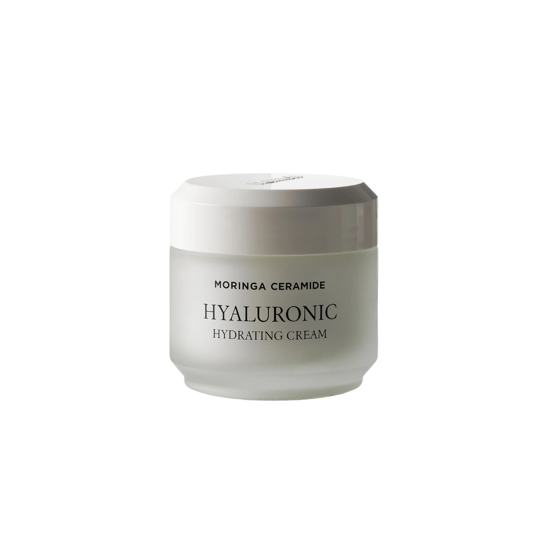 HEIMISH Moringa Ceramide Hyaluronic Hydrating Cream is a rich, nourishing moisturizer designed to deeply hydrate and strengthen the skin barrier. Infused with Moringa Seed Oil and Ceramide NP, it locks in moisture and enhances skin resilience. Hydrolyzed Hyaluronic Acid delivers intense hydration, while Shea Butter and Beta-Glucan soothe and soften the skin. The creamy texture absorbs smoothly, leaving your skin feeling plump, calm, and revitalized. Perfect for daily use to maintain a healthy, balanced comp