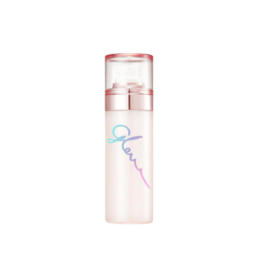 MISSHA Glow Skin Balm To Go Mist is a luxurious facial mist designed to refresh and rejuvenate your skin with a burst of moisture and radiance. Infused with Rosa Damascena Flower Water and a complex of nourishing oils including Jojoba and Sunflower Seed, this mist boosts skin's natural glow and hydration. Enhanced with Niacinamide and a blend of fruit extracts, it helps to brighten and refine skin tone. Perfect for a midday pick-me-up, this mist leaves your skin feeling hydrated, plump, and beautifully radi