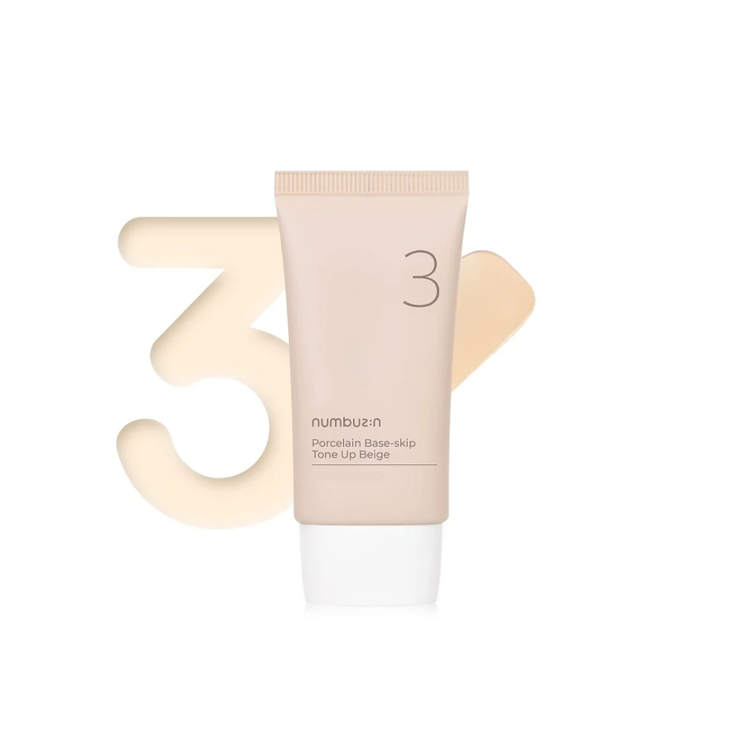 NUMBUZIN No. 3 Porcelain Base-Skip Tone Up Beige is a silky, lightweight cream that enhances your complexion while providing hydration and soothing care. Formulated with skin-loving ingredients like Centella Asiatica, Green Tea, and Licorice Root Extract, it helps to calm and nourish your skin. Niacinamide boosts brightness, while botanical extracts such as Rosemary and Chamomile promote a soft, even finish. Ideal for achieving a naturally radiant look, this tone-up cream is perfect for everyday wear.