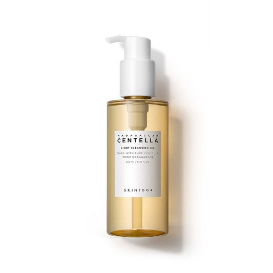 SKIN1004 Madagascar Centella Light Cleansing Oil is a gentle, lightweight oil that effectively removes makeup and impurities while nourishing the skin. Enriched with 10,000 ppm of Centella Asiatica Extract, along with natural oils like Sunflower, Olive, and Jojoba, it soothes and hydrates the skin as it cleanses. This cleansing oil also features Bergamot and Rose oils for a refreshing, calming experience, leaving your skin soft, clean, and balanced. Ideal for all skin types, it provides a deep yet gentle cl