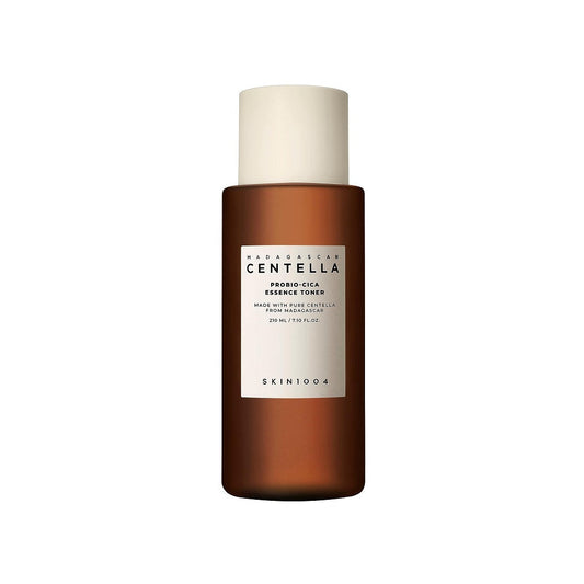 SKIN1004 Madagascar Centella Probio-Cica Essence Toner is a nourishing formula that hydrates and soothes the skin. Featuring Centella Asiatica Extract and its ferment filtrate, this toner boosts skin healing and calms irritation. It's enriched with Panthenol, Hyaluronic Acid, and Ceramide NP, which help maintain moisture levels and strengthen the skin barrier. Additionally, ingredients like Madecassic Acid and Asiaticoside enhance skin texture and resilience. Suitable for all skin types, this essence toner 